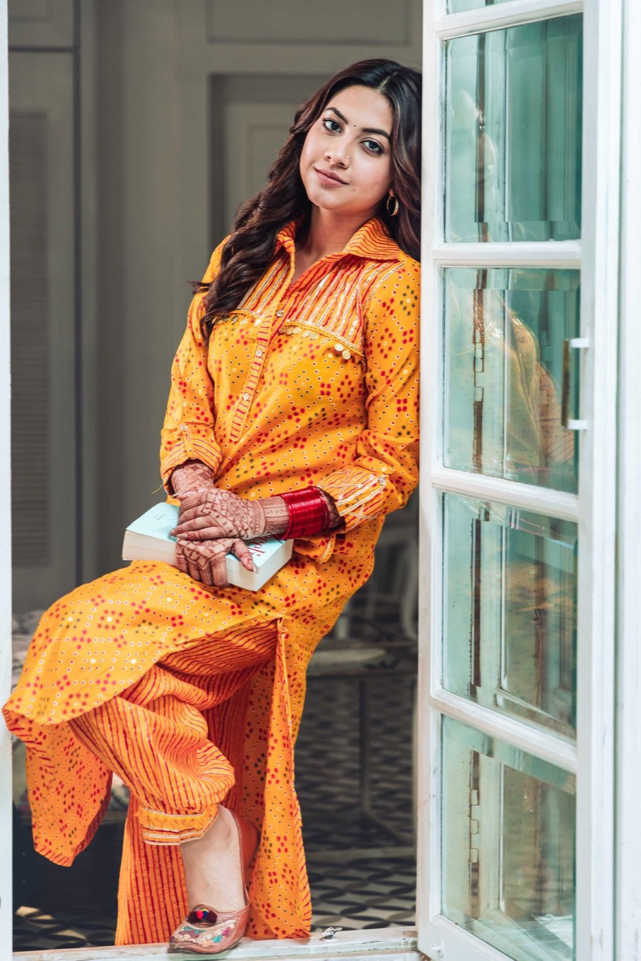 Portrait of actress Reem Sameer Shaikh in yellow, by Sohail Joshi